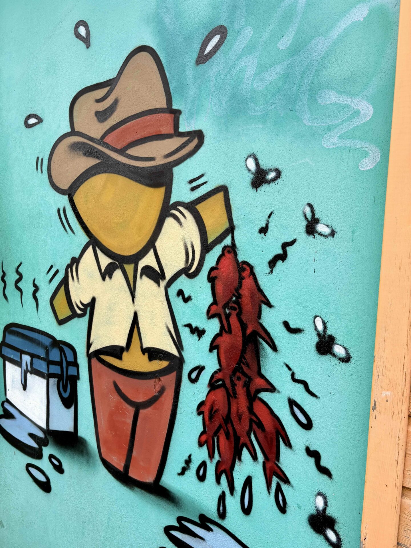 Gouzou pêcheur, une des œuvres de street art de l'artiste Jace, qui met en avant la culture réunionnaise et métissée